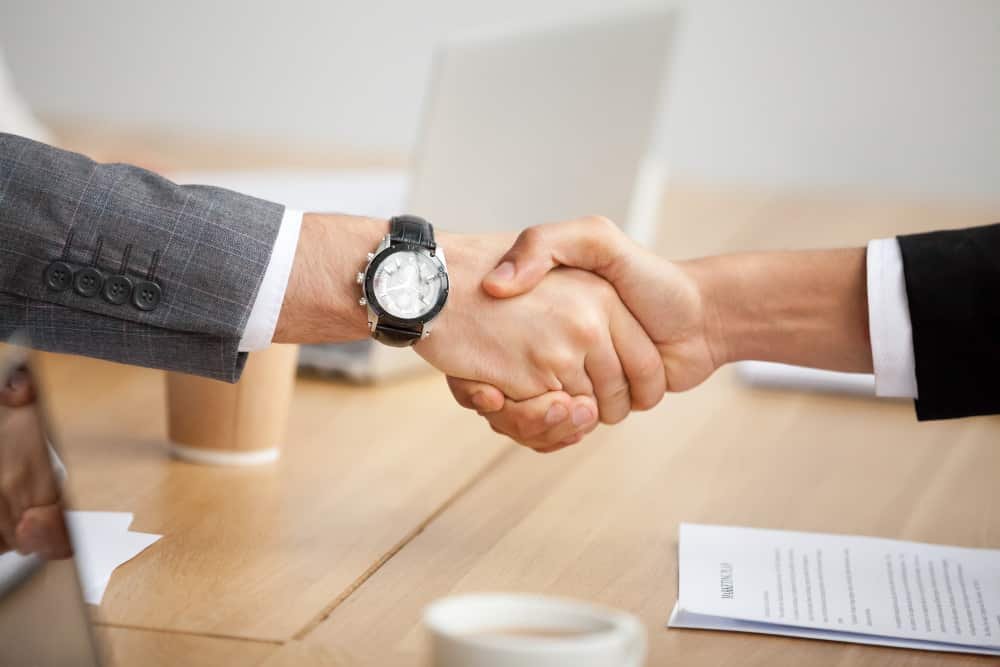 closeup-view-handshake-two-businessmen-suits-shaking-hands